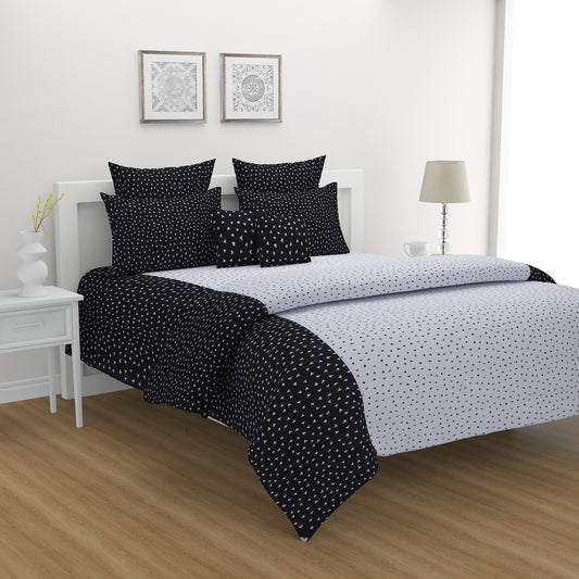 Geometric bird print bedsheet set, 200TC cotton bedding, black and white bedroom design, abstract pattern sheets, modern duo-tone linens, contemporary avian design, small pattern bedspread, complementary bedsheet set, stylish geometric decor, luxury cotton bed set, artistic bird motif, minimalistic bedroom style.