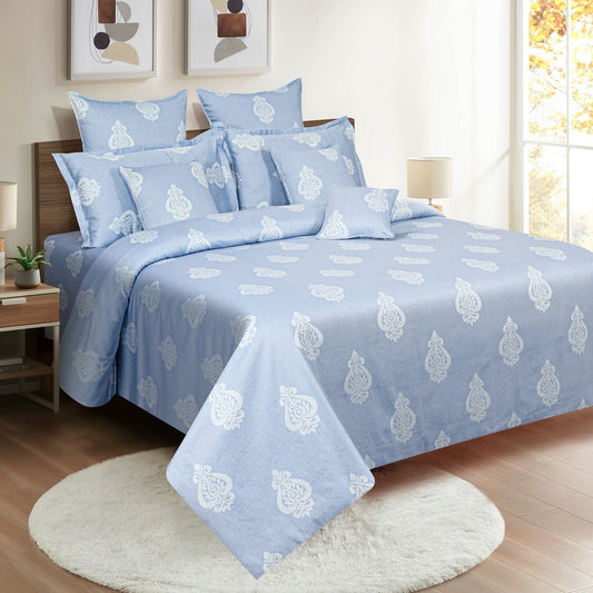 : Light blue bedding, ethnic motif satin sheets, cotton satin comforter, serene bedroom decor, luxury light blue bedspread, elegant cotton bedding, hypoallergenic satin linens, duo-tone bedroom style, high-thread-count bed linens.