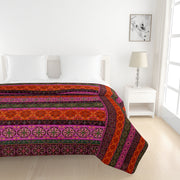 Ethnic cotton bedsheet, 200 thread count, vibrant bed linen, bohemian bedroom decor, artisanal bedding, mix and match patterns, gemstone hues bedspread, red orange green blue bedding, multicultural design, small print textiles, handcrafted look, pure cotton comfort, bright bedroom aesthetics, eclectic home style.