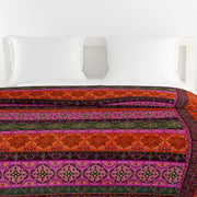 Ethnic cotton bedsheet, 200 thread count, vibrant bed linen, bohemian bedroom decor, artisanal bedding, mix and match patterns, gemstone hues bedspread, red orange green blue bedding, multicultural design, small print textiles, handcrafted look, pure cotton comfort, bright bedroom aesthetics, eclectic home style.