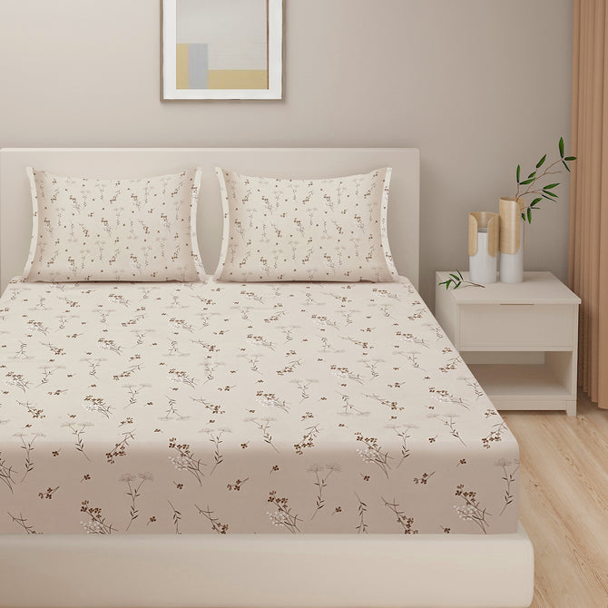 Warm beige bedding, botanical print bedspread, cotton satin sheets, hypoallergenic comforter set, all-season bedroom comfort, nature-inspired bed linens, elegant botanical bedding, versatile decor textile, soft cotton satin, durable bed set, luxury bedroom collection, serene bedroom design.