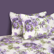 Whispering Lilacs bedding, 160TC purple garden bedspread, floral mix n match sheets, 100% cotton floral bedding, purple white green bedroom, violet grape comforter, luxurious cotton duvet, hypoallergenic floral linen, spring bloom bed set, vibrant bedroom decor, botanical print bedding, serene garden theme, elegant floral patterns, cozy bedroom textiles, high-quality cotton fabric, comfortable and breathable, botanical bedroom aesthetics, lilac-inspired bedding collection, nature-themed sleep sanctuary