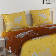 sublime morning bedding, 250TC cotton satin sheets, leafy floral bedspread, yellow and brown bedding set, luxurious cotton satin bed linen, earthy morning design, yellow and brown bedding, serene sunrise bedspread, natural look bedding, high-quality cotton satin bedding, nature-inspired bed linen, stylish bedroom design, elegant bed linen set