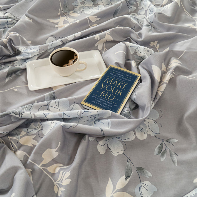 Champa flower bedding, grey cotton satin, 250 thread count luxury, floral pattern sheets, hypoallergenic duvet cover, nature-inspired bed set, soothing bedroom decor, premium quality linens, elegant botanical design, all-season comforter.