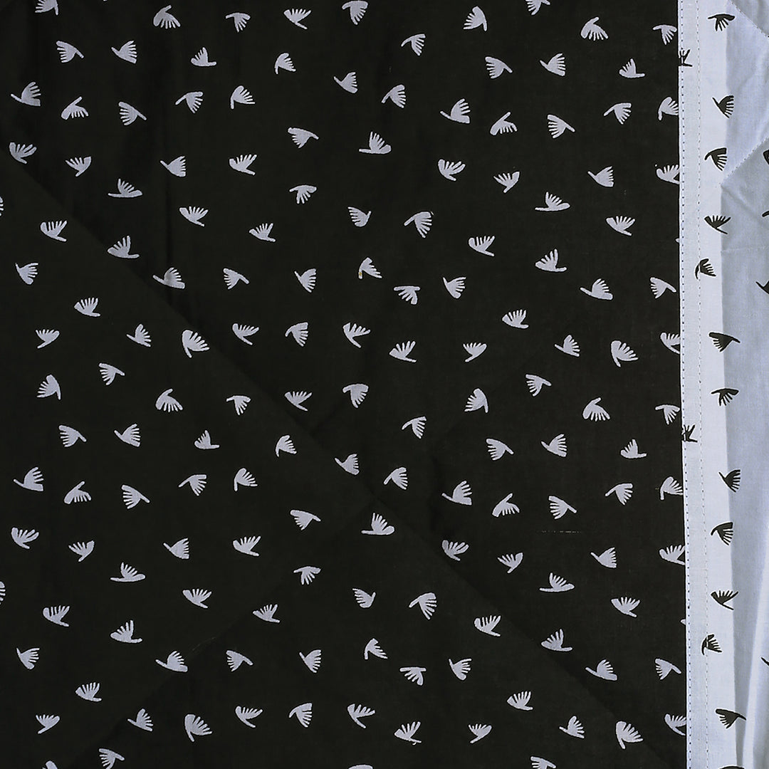 Geometric bird print bedsheet set, 200TC cotton bedding, black and white bedroom design, abstract pattern sheets, modern duo-tone linens, contemporary avian design, small pattern bedspread, complementary bedsheet set, stylish geometric decor, luxury cotton bed set, artistic bird motif, minimalistic bedroom style.