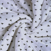 Geometric bird print bedsheet set, 200TC cotton bedding, black and white bedroom design, abstract pattern sheets, modern duo-tone linens, contemporary avian design, small pattern bedspread, complementary bedsheet set, stylish geometric decor, luxury cotton bed set, artistic bird motif, minimalistic bedroom style.