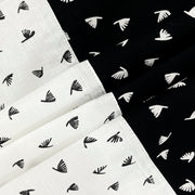 Geometric bird print bedsheet set, 200TC cotton bedding, black and white bedroom design, abstract pattern sheets, modern duo-tone linens, contemporary avian design, small pattern bedspread, complementary bedsheet set, stylish geometric decor, luxury cotton bed set, artistic bird motif, minimalistic bedroom style.